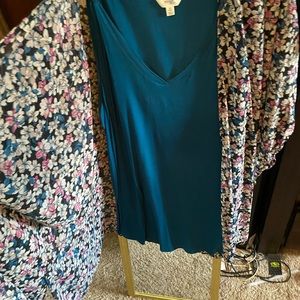 Teal shirt with sewn on cover-up, never worn.